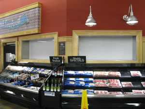 Cortinas aislantes para ahorro energético en vitrinas y expositores de frio comercial en supermercados